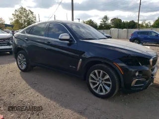 2019 BMW X6 xDrive35i with VIN 5UXKU2C57K0Z62913, listed as a Copart auction lot 70835223 with 56,985 mi miles. Bid and sale history available at carsss.com. Image 4.