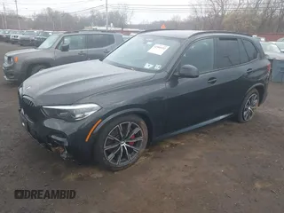 2023 BMW X5 xDrive40i with VIN 5UXCR6C01P9S01895, listed as a IAAI auction lot 41905192 with 33,326 mi miles and . Bid and sale history available at DreamBid. Image 2.