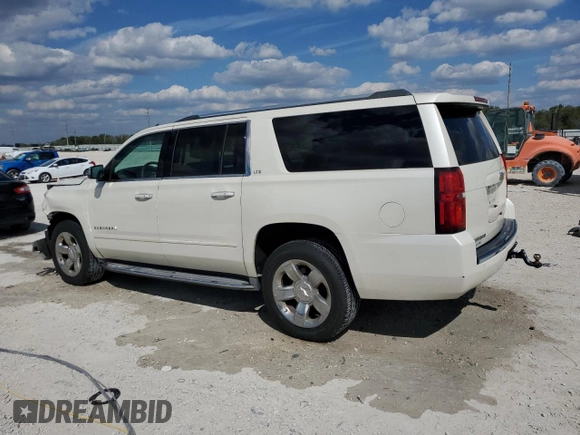 2015 Chevrolet Suburban LTZ with VIN 1GNSKKKC6FR119849, listed as a Copart auction lot 47176815 with 67,235 mi miles and Salvage Title. Bid and sale history available at carsss.com. Image 2.
