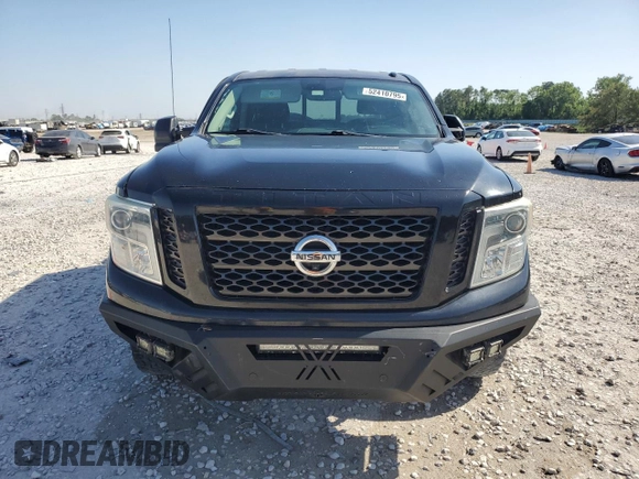2016 Nissan Titan SL z VIN 1N6BA1F4XGN509402, wystawiony jako Copart lot #52410795 z przebiegiem 37 421 mil mil oraz Szkoda całkowita • Salvage title. Historia ofert i sprzedaży dostępna na DreamBid. Obrazek 5.