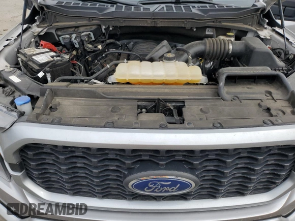 2023 Ford F-150 XL с VIN 1FTFW1E50PFB67954, выставлен на аукционе Copart как лот 59444435 с пробегом 56 024 миль миль и Списание • Salvage title. История ставок и продаж доступна на DreamBid. Изображение 11.