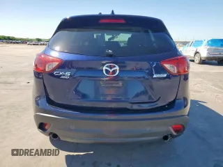 2013 Mazda CX-5 Touring with VIN JM3KE4CEXD0143205, listed as a Copart auction lot 54143235 with 258,715 mi miles and Clean Title. Bid and sale history available at carsss.com. Image 6.