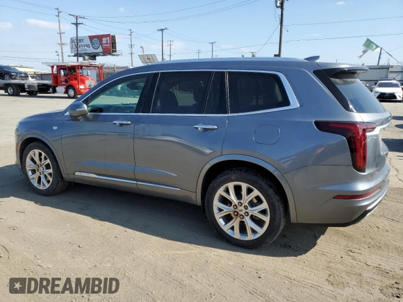 2020 Cadillac XT6 FWD Premium Luxury with VIN 1GYKPCRS5LZ201302, listed as a Copart auction lot 55103225 with 61,527 mi miles and Salvage Title. Bid and sale history available at carsss.com. Image 2.