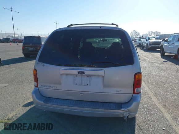 2003 Ford Windstar LX with VIN 2FMZA51413BA16113, listed as a IAAI auction lot 41850359 with 128,768 mi miles and . Bid and sale history available at DreamBid. Image 16.