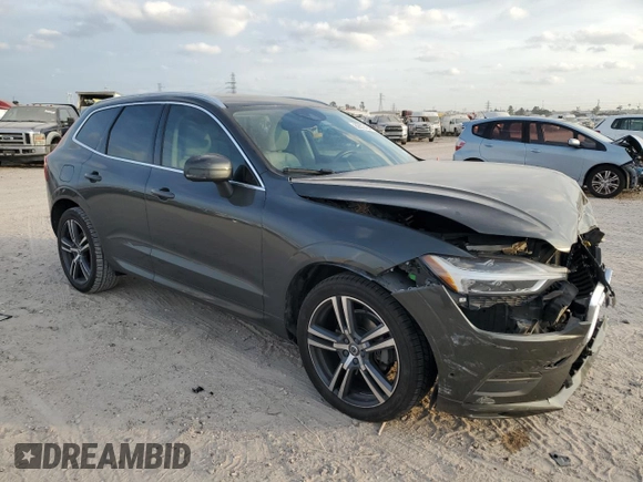 2018 Volvo XC60 Momentum with VIN LYV102RK0JB106389, listed as a Copart auction lot 82677454 with 114,832 mi miles and Salvage Title. Bid and sale history available at carsss.com. Image 4.