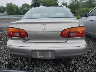 1999 Chevrolet Prizm z VIN 1Y1SK5284XZ403676, wystawiony jako Copart lot #57961725 z przebiegiem Nie podano mil oraz Szkody całkowita. Historia ofert i sprzedaży dostępna na DreamBid. Obrazek 6.
