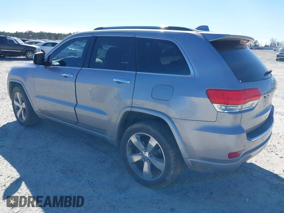 2014 Jeep Grand Cherokee Overland with VIN 1C4RJECG9EC206787, listed as a IAAI auction lot 41730875 with 194,196 mi miles. Bid and sale history available at carsss.com. Image 3.