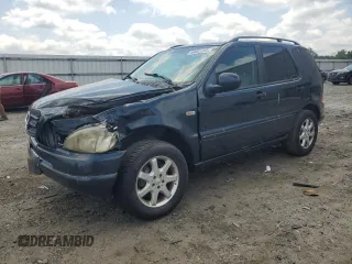 2000 Mercedes-Benz M 320/430/500 with VIN 4JGAB72E7YA168445, listed as a Copart auction lot 59401235 with 231,591 mi miles and Salvage title. Bid and sale history available at DreamBid. Image 1.