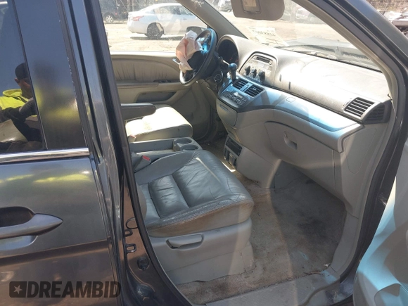 2005 Honda Odyssey EX-L with VIN 5FNRL387X5B069823, listed as a IAAI auction lot 41883007 with 267,250 mi miles and . Bid and sale history available at DreamBid. Image 5.