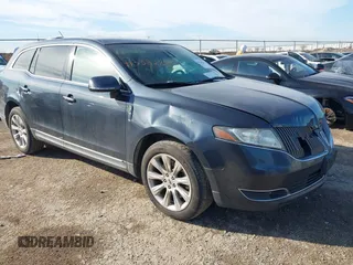 2013 Lincoln MKT with VIN 2LMHJ5FK8DBL54004, listed as a IAAI auction lot 41338284 with 142,853 mi miles and . Bid and sale history available at DreamBid. Image 1.