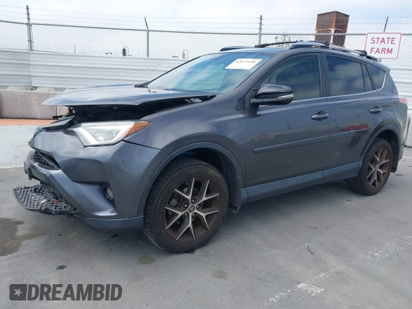 2017 Toyota RAV4 SE with VIN JTMJFREV5HJ155712, listed as a IAAI auction lot 42613998 with 72,112 mi miles and . Bid and sale history available at DreamBid. Image 17.