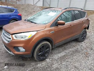2017 Ford Escape SE with VIN 1FMCU9G96HUC12475, listed as a IAAI auction lot 41741342 with 102,823 mi miles. Bid and sale history available at carsss.com. Image 2.