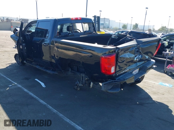 2018 Chevrolet Silverado 1500 LTZ with VIN 3GCUKSEC1JG560567, listed as a IAAI auction lot 41664625 with Not Provided miles and . Bid and sale history available at DreamBid. Image 3.
