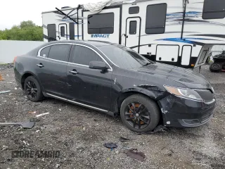 2015 Lincoln MKS z VIN 1LNHL9DK1FG601889, wystawiony jako Copart lot #60241635 z przebiegiem 249 283 mil mil oraz Czysty tytuł • Clean title. Historia ofert i sprzedaży dostępna na DreamBid. Obrazek 4.