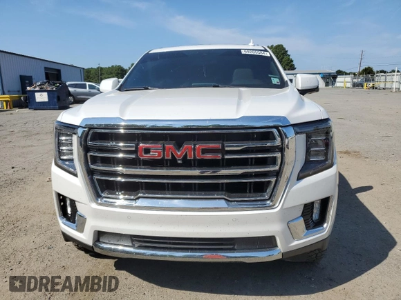 2021 GMC Yukon SLT with VIN 1GKS1BKT0MR425247, listed as a Copart auction lot 69205584 with 72,952 mi miles and Salvage Title. Bid and sale history available at carsss.com. Image 5.
