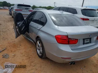 2015 BMW 3 Series 328i with VIN WBA3A5C59FP605386, listed as a IAAI auction lot 42309429 with 164,463 mi miles and . Bid and sale history available at DreamBid. Image 3.