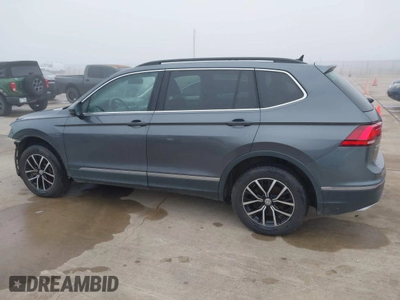 2021 Volkswagen Tiguan SE with VIN 3VV2B7AX8MM143189, listed as a IAAI auction lot 41646843 with 56,672 mi miles and . Bid and sale history available at DreamBid. Image 14.