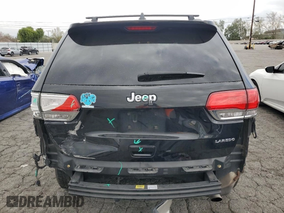 2018 Jeep Grand Cherokee Laredo E with VIN 1C4RJEAG5JC339222, listed as a Copart auction lot 51251135 with 69,025 mi miles and Salvage Title. Bid and sale history available at carsss.com. Image 6.