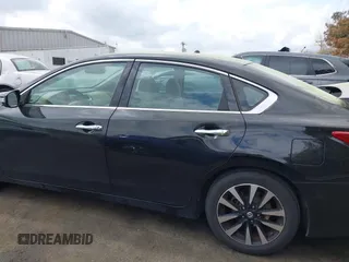 2018 Nissan Altima S with VIN 1N4AL3AP3JC195154, listed as a IAAI auction lot 41879582 with 160,162 mi miles and . Bid and sale history available at DreamBid. Image 14.