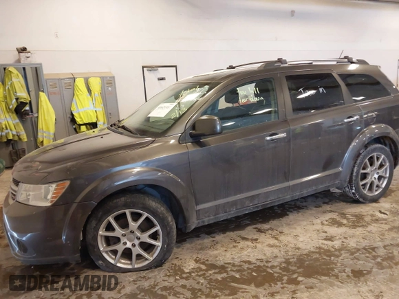2016 Dodge Journey R/T with VIN 3C4PDDFGXGT221231, listed as a IAAI auction lot 41621414 with 130,555 mi miles and . Bid and sale history available at DreamBid. Image 2.