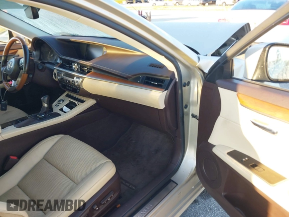 2016 Lexus ES 300h z VIN JTHBW1GG4G2106710, wystawiony jako IAAI lot #41684479 z przebiegiem 144 559 mil mil oraz . Historia ofert i sprzedaży dostępna na DreamBid. Obrazek 14.