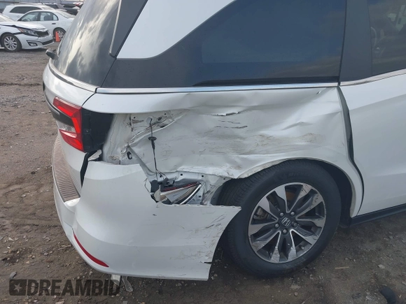 2022 Honda Odyssey EX-L with VIN 5FNRL6H77NB032262, listed as a IAAI auction lot 40772227 with 35,053 mi miles and . Bid and sale history available at DreamBid. Image 6.