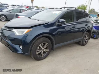 2018 Toyota RAV4 XLE with VIN JTMRFREV6JJ248098, listed as a IAAI auction lot 42042239 with 74,765 mi miles. Bid and sale history available at carsss.com. Image 2.