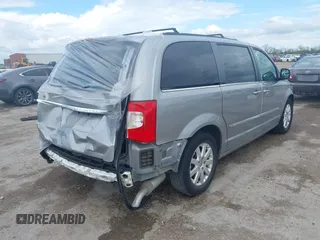 2016 Chrysler Town & Country Touring with VIN 2C4RC1BG0GR213058, listed as a IAAI auction lot 41910462 with 125,013 mi miles and . Bid and sale history available at DreamBid. Image 4.