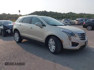 2017 Cadillac XT5 Premium Luxury FWD z VIN 1GYKNCRSXHZ164468, wystawiony jako IAAI lot #40314503 z przebiegiem 94 008 mil mil oraz . Historia ofert i sprzedaży dostępna na DreamBid. Obrazek 1.