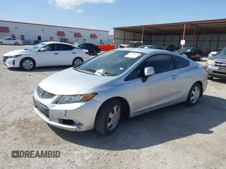 2012 Honda Civic Cpe LX with VIN 2HGFG3B52CH549698, listed as a IAAI auction lot 41818647 with 100,975 mi miles. Bid and sale history available at carsss.com. Image 17.