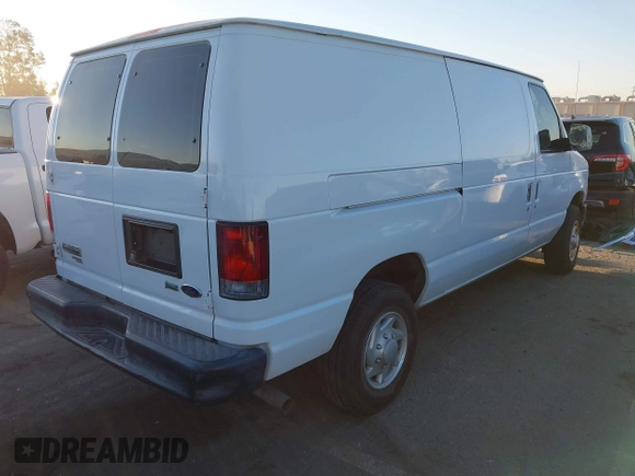 2011 Ford Econoline Cargo Commercial with VIN 1FTNE2EL2BDA71427, listed as a IAAI auction lot 41755582 with 157,531 mi miles. Bid and sale history available at carsss.com. Image 4.