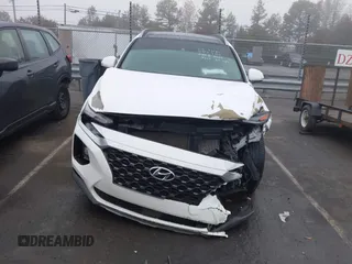 2019 Hyundai Santa Fe Ultimate with VIN 5NMS5CAA3KH036089, listed as a IAAI auction lot 40810710 with 62,561 mi miles and . Bid and sale history available at DreamBid. Image 12.