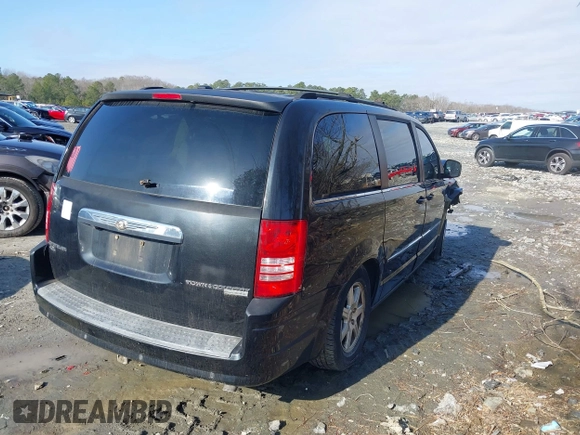 2009 Chrysler Town & Country Touring with VIN 2A8HR54X39R629941, listed as a IAAI auction lot 41525899 with 151,803 mi miles and . Bid and sale history available at DreamBid. Image 4.