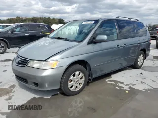 2002 Honda Odyssey EX-L with VIN 5FNRL18972B014389, listed as a Copart auction lot 45873525 with 301,256 mi miles and Salvage title. Bid and sale history available at DreamBid. Image 1.
