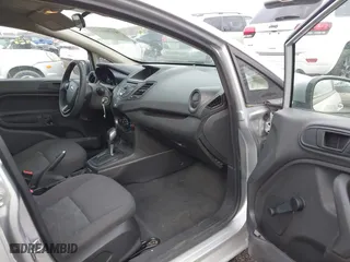 2015 Ford Fiesta S with VIN 3FADP4AJ5FM125857, listed as a IAAI auction lot 41704494 with 73,151 mi miles. Bid and sale history available at carsss.com. Image 5.