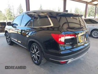 2021 Honda Pilot Touring 8-Passenger z VIN 5FNYF6H99MB049728, wystawiony jako IAAI lot #42194602 z przebiegiem 41 374 mil mil oraz . Historia ofert i sprzedaży dostępna na DreamBid. Obrazek 3.