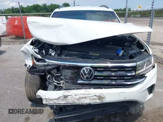 2021 Volkswagen Atlas SE с VIN 1V2WR2CA5MC569901, выставлен на аукционе IAAI как лот 42397774 с пробегом 75 802 миль миль и . История ставок и продаж доступна на DreamBid. Изображение 6.
