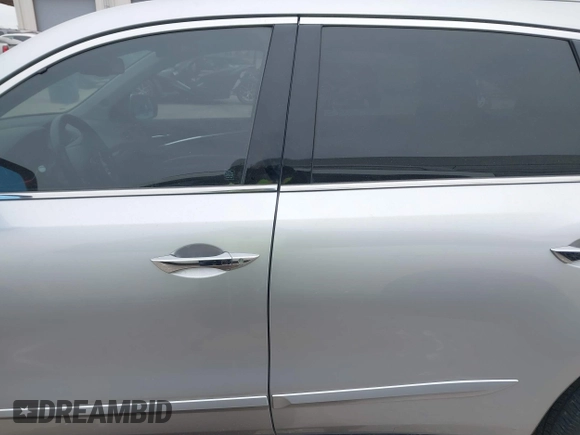 2015 Acura MDX with VIN 5FRYD3H21FB008759, listed as a IAAI auction lot 41277056 with 121,771 mi miles and . Bid and sale history available at DreamBid. Image 14.
