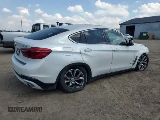 2017 BMW X6 sDrive35i z VIN 5UXKU0C52H0F99663, wystawiony jako Copart lot #57293445 z przebiegiem 71 491 mil mil oraz Szkody całkowita. Historia ofert i sprzedaży dostępna na DreamBid. Obrazek 3.