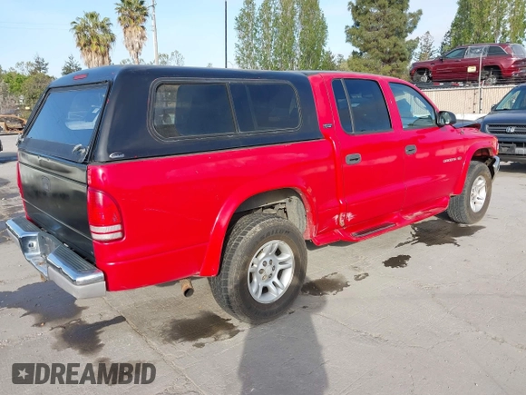 2001 Dodge Dakota Sport with VIN 1B7GG2AN51S148828, listed as a IAAI auction lot 42095653 with 232,995 mi miles and . Bid and sale history available at carsss.com. Image 4.