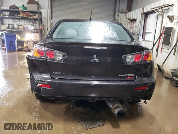 2013 Mitsubishi Lancer Evolution MR z VIN JA32W5FV5DU016540, wystawiony jako Copart lot #47615845 z przebiegiem 79 599 mil mil oraz Szkoda całkowita • Salvage title. Historia ofert i sprzedaży dostępna na DreamBid. Obrazek 6.
