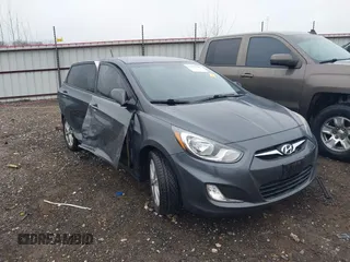 2012 Hyundai Accent SE with VIN KMHCU5AE9CU013458, listed as a IAAI auction lot 41475986 with 88,592 mi miles. Bid and sale history available at carsss.com. Image 1.