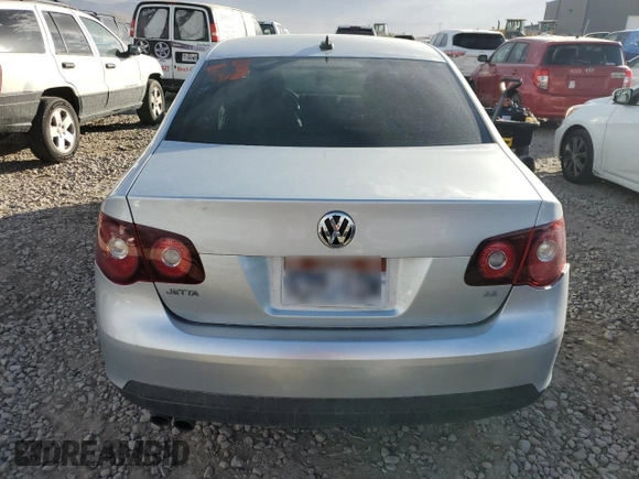 2009 Volkswagen Jetta SE с VIN 3VWRM71K99M061312, выставлен на аукционе Copart как лот 42747695 с пробегом 189 183 миль миль и Списание • Salvage title. История ставок и продаж доступна на DreamBid. Изображение 6.