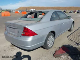 2003 Honda Civic EX with VIN 1HGEM229X3L072586, listed as a IAAI auction lot 40634772 with 202,134 mi miles. Bid and sale history available at carsss.com. Image 4.