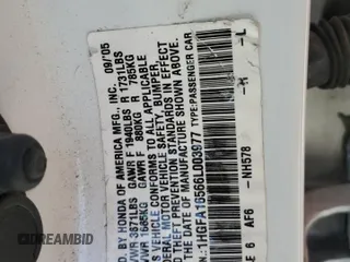 2006 Honda Civic LX z VIN 1HGFA16566L003977, wystawiony jako Copart lot #56765875 z przebiegiem 220 705 mil mil oraz Szkoda całkowita • Salvage title. Historia ofert i sprzedaży dostępna na DreamBid. Obrazek 13.