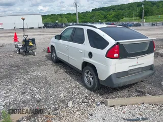2002 Pontiac Aztek z VIN 3G7DA03E52S579681, wystawiony jako IAAI lot #42165625 z przebiegiem Nie podano mil oraz . Historia ofert i sprzedaży dostępna na DreamBid. Obrazek 3.