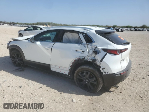 2021 Mazda CX-30 Premium z VIN 3MVDMBDYXMM308490, wystawiony jako Copart lot #49527905 z przebiegiem Nie podano mil oraz Szkoda całkowita • Salvage title. Historia ofert i sprzedaży dostępna na DreamBid. Obrazek 2.