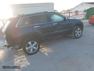 2014 Jeep Grand Cherokee Overland with VIN 1C4RJFCG0EC206358, listed as a IAAI auction lot 41893508 with 120,327 mi miles. Bid and sale history available at carsss.com. Image 4.