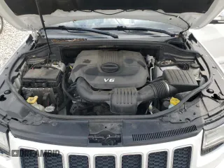 2015 Jeep Grand Cherokee Overland z VIN 1C4RJFCG8FC726437, wystawiony jako Copart lot #63671265 z przebiegiem 158 452 mil mil oraz Czysty tytuł • Clean title. Historia ofert i sprzedaży dostępna na DreamBid. Obrazek 12.