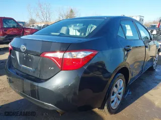 2016 Toyota Corolla L with VIN 5YFBURHE7GP422140, listed as a IAAI auction lot 41978381 with 87,845 mi miles. Bid and sale history available at carsss.com. Image 4.